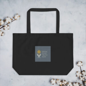 Black tote bag with motivational quote design.