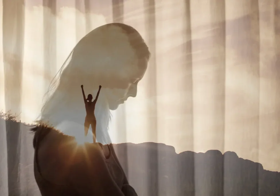 Silhouette with triumphant pose and contemplative profile.